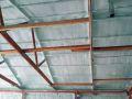 pole barn ceiling covered with spray foam