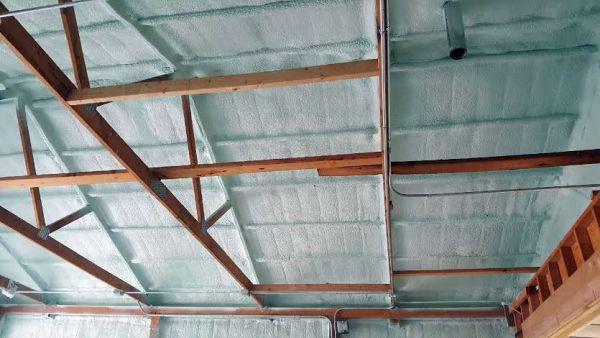 pole barn ceiling covered with spray foam