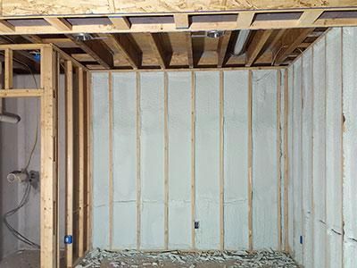 basement wall with spray foam insulation